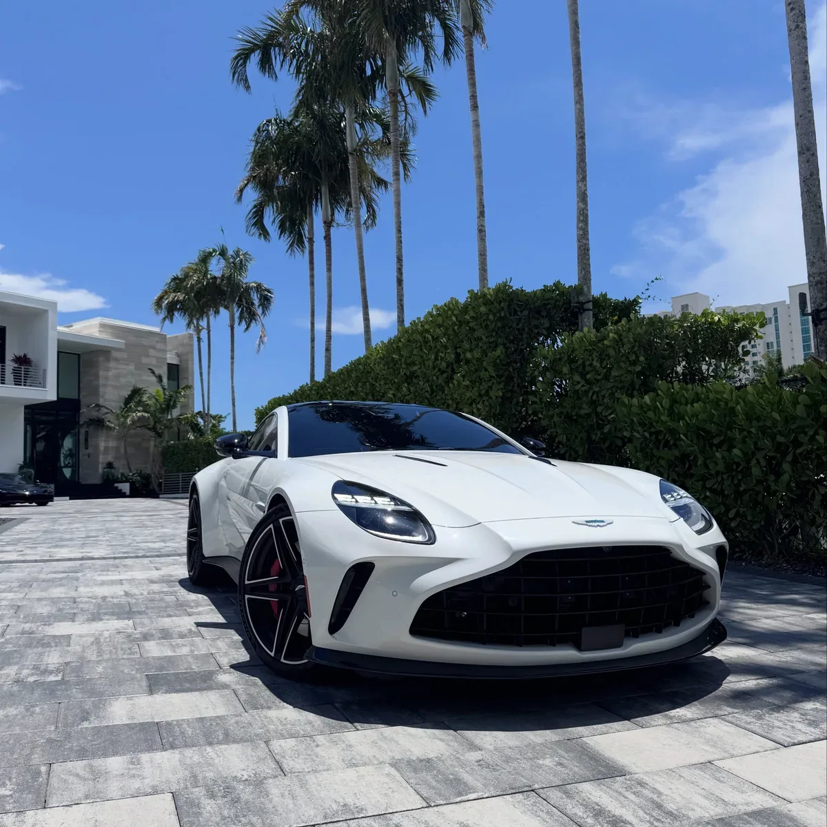 White Aston Martin with freshly tinted windows